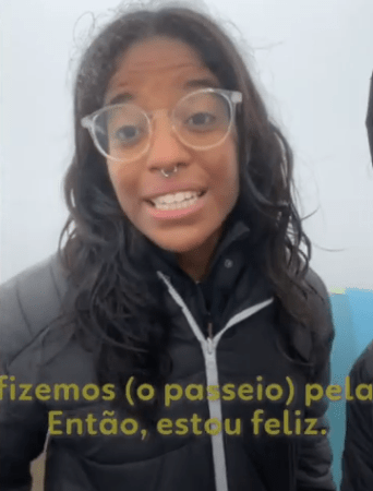 Screenshot of a woman speaking.