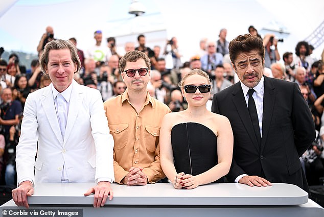 Cera called Anderson a big influence 'on my general sense of taste and humor and aspirations as a performer. So, I think if I fit in his thing, it's because I've grown up on him'; Pictured with Anderson, Threapleton and Benicio del Toro in Cannes in May
