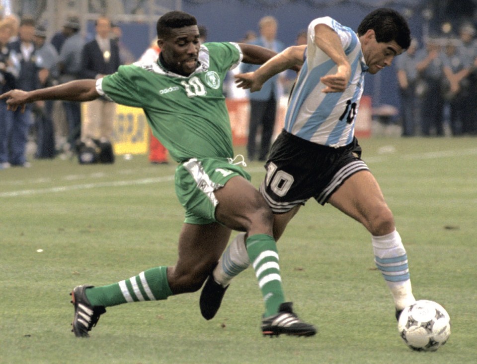 Jay-Jay Okocha of Nigeria and Diego Maradona of Argentina in a 1994 World Cup match.