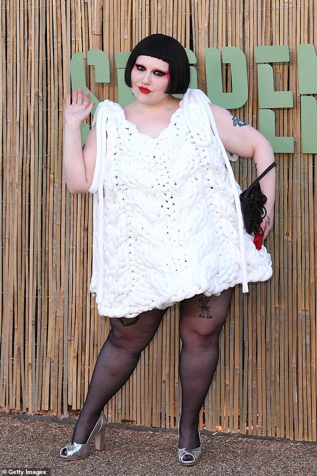 Beth Ditto wore a white wool dress, black tights and silver heels