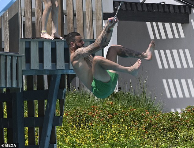 The family splashed in the pool, met Mickey Mouse at the Disney resort and a theme park