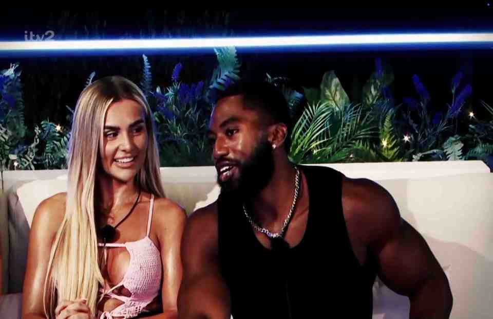 Poppy and Remell from Love Island playing games.