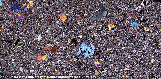 For the study, the team collected more than 130 volcanic rock samples from across the Afar region. Pictured, microscope image of a thin sliver of one of the volcanic rocks from Afar, Ethiopia