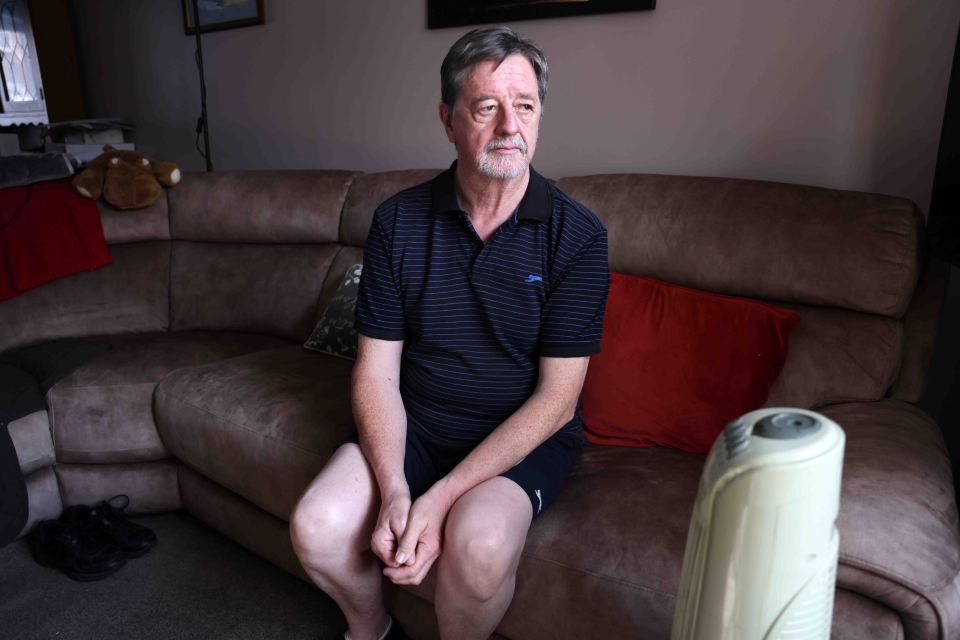 Man sitting on a couch.