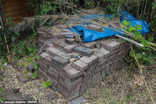 Taking six months to complete, the 83-square-metre brick annex features a kitchen diner, two bedrooms, alongside a bathroom and storeroom. Pictured: leftover building materials at Mr Jones' bungalow