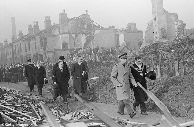 King George VI makes a visit to Birmingham during The Blitz during World War Two