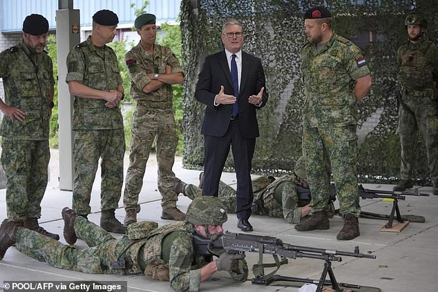 The PM met soldiers during a visit to a Dutch marine training centre, as part of the UK-Netherlands Joint Amphibious Force in Rotterdam, on the sidelines of the NATO summit