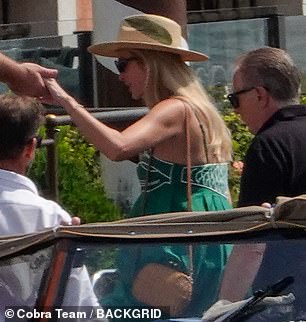 Businesswoman Ivanka looked stunning in a green dress as she arrived by boat