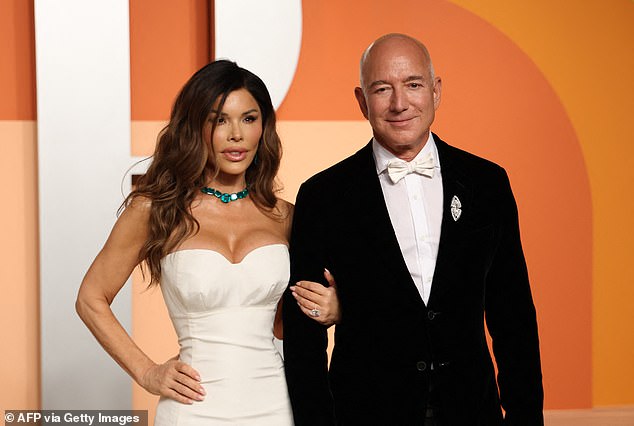CEO of Amazon Jeff Bezos and partner Lauren Sanchez attend the Vanity Fair Oscar Party at the Wallis Annenberg Center for the Performing Arts in Beverly Hills, California, on March 2, 2025