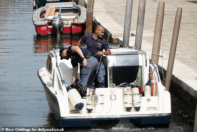 Private security are seen patrolling the area of where the wedding events will be held