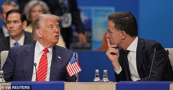 U.S. President Donald Trump and NATO General Secretary Mark Rutte attend a North Atlantic Council plenary meeting during the the NATO summit in The Hague, Netherlands, Wednesday, June 25, 2025.  Kin Cheung/Pool via REUTERS