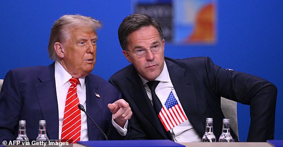 US President Donald Trump and NATO Secretary General Mark Rutte speak at the start of a NATO leaders summit in The Hague, Netherlands June 25, 2025. (Photo by JOHN THYS / AFP) (Photo by JOHN THYS/AFP via Getty Images)