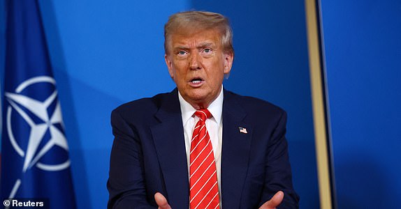 U.S. President Donald Trump speaks, as he meets with NATO Secretary General MarkÂ Rutte (not pictured) at the NATO summit in The Hague, Netherlands June 25, 2025. REUTERS/Piroschka Van De Wouw/Pool