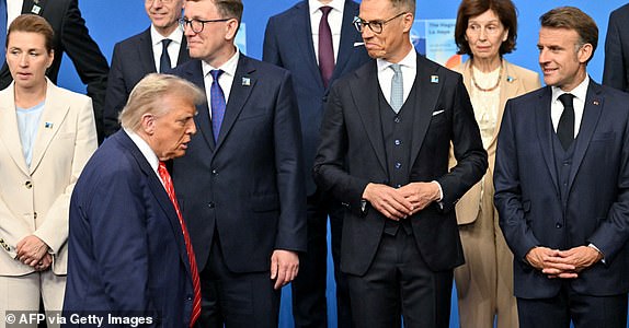 US President Donald Trump (2L) arrives to pose with NATO country leaders for a family photo during the North Atlantic Treaty Organization (NATO) Heads of State and Government summit in The Hague, on June 25, 2025. NATO leaders hold a two-day summit on June 24 and 25 in The Hague. (Photo by NICOLAS TUCAT / AFP) (Photo by NICOLAS TUCAT/AFP via Getty Images)