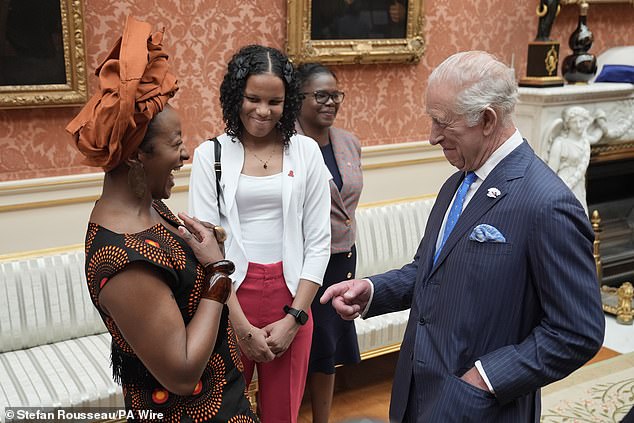 The King was in high spirits as he enjoyed chatting with VIP guests at the reception this afternoon