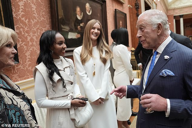 Charles, Joanna Lumley and Rosie Huntington-Whiteley pictured during a reception for the winners of the King's Trust Awards