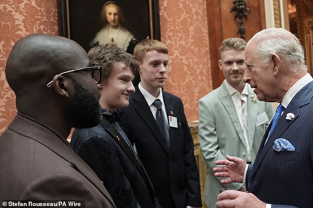 Charles looked to be in deep focus as he enjoyed chatting with attendees at the King's Trust Awards reception