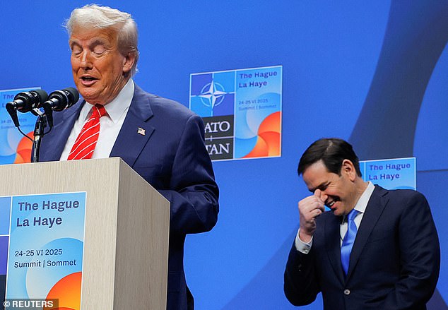 Secretary of State Marco Rubio (right) giggles behind President Donald Trump (left) as he answered questions about being called 'daddy' by NATO Secretary General Mark Rutte during the Wednesday conference in the Hague, Netherlands