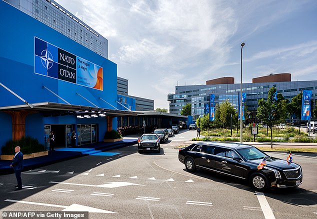 The presidential limousine "The Beast" takes President Donald Trump away from the NATO meeting and to the airport for the flight back to the United States
