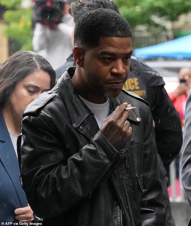 Kid Cudi, real name Scott Mescudi, is seen arriving at the federal courthouse on May 22 to testify