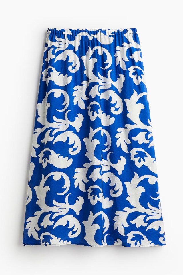 Blue skirt with white floral pattern.