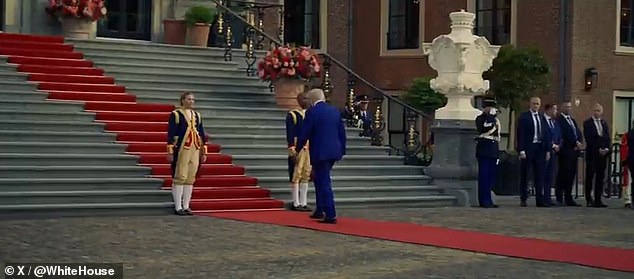 The music video features snippets of Trump's meetings at NATO, including with Rutte