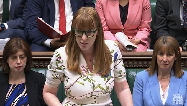 Angela Rayner insisted the vote will go ahead on Tuesday as she stood in at PMQs flanked by Rachel Reeves (right)