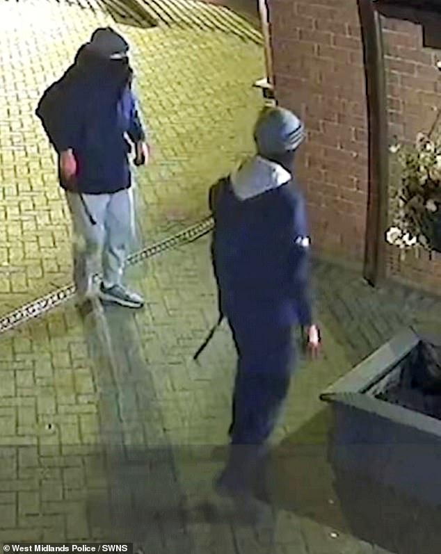 The masked gang used tools to pry open windows at the property