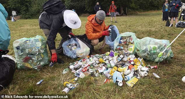 A litter clean-up at the Stone Circle area of the Glastonbury site at Worthy Farm this morning