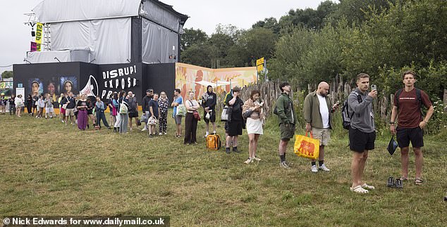 Long queues for the showers at Glastonbury Festival at Worthy Farm in Somerset this morning