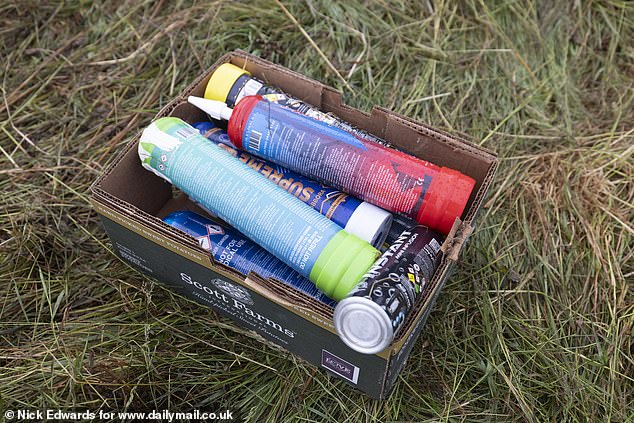 Nitrous oxide canisters are found during a clean-up at Glastonbury's Stone Circle this morning