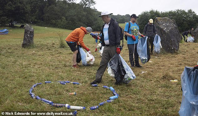 Nitrous oxide canisters are found during a clean-up at Glastonbury's Stone Circle this morning