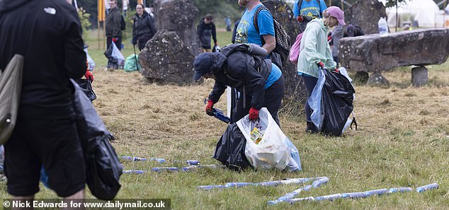 A litter clean-up at the Stone Circle area of the Glastonbury site at Worthy Farm this morning