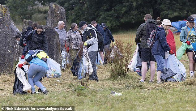A litter clean-up at the Stone Circle area of the Glastonbury site at Worthy Farm this morning