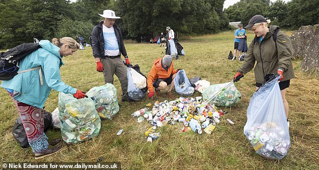 A litter clean-up at the Stone Circle area of the Glastonbury site at Worthy Farm this morning
