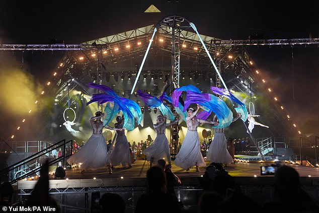 Dancers and acrobats on the Pyramid Stage for last night's Glastonbury opening ceremony