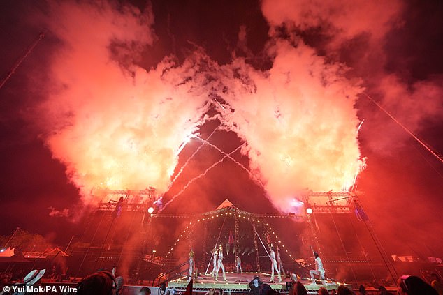Circus performers in the Glastonbury opening ceremony on the Pyramid Stage last night