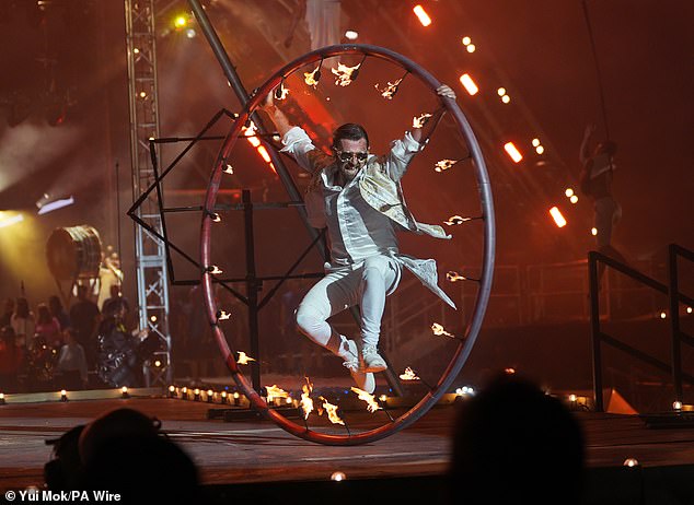 Circus performers take part in last night's opening ceremony on the Pyramid Stage