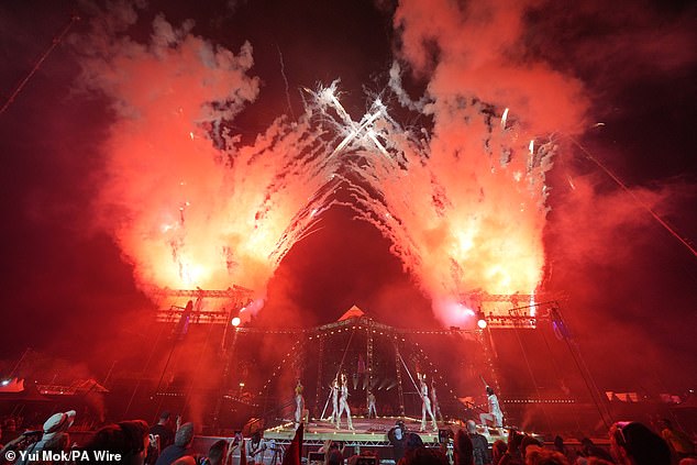 The ceremony finishes with fireworks as the festival begins at Worthy Farm in Somerset