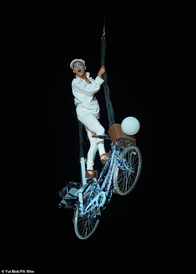 Circus performers involved in the opening ceremony last night on the Pyramid Stage