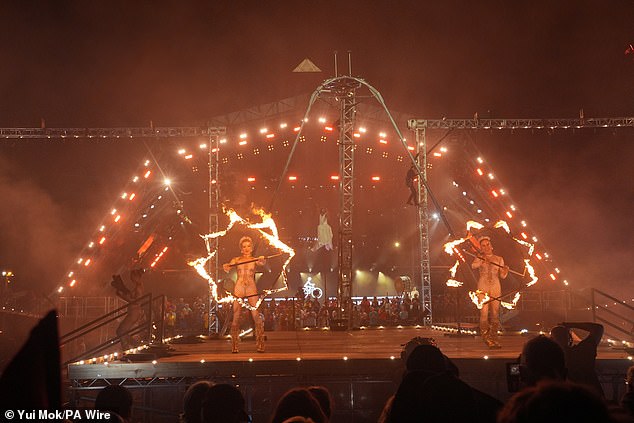 Circus performers in the Glastonbury opening ceremony on the Pyramid Stage last night