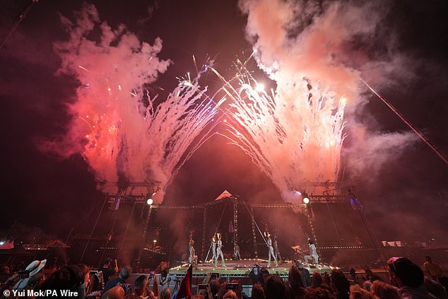 The ceremony finishes with fireworks as the festival begins at Worthy Farm in Somerset