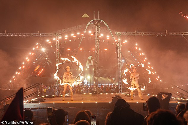 Circus performers in the Glastonbury opening ceremony on the Pyramid Stage last night
