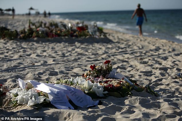 Tributes to victims on the beach near the RIU Imperial Marhaba hotel in Sousse, Tunisia