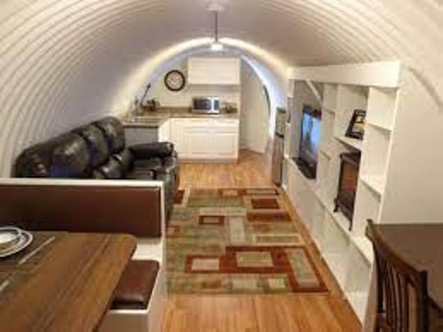 Burrowed's bunkers include an air tight door, fresh water and a tank, a bathroom with a sower and composting toilet, an electric heater, full kitchen, beds, sofas, shelving and underground storage for food and clothes and solar charging (pictured)