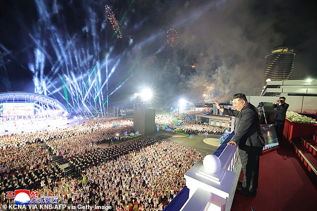 Photos released by state media showed Kim and his family sitting and watching the inauguration ceremony