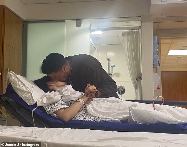 Her partner Chanan Safir Colman was also seen sweetly kissing her as she prepared to be wheeled down to surgery