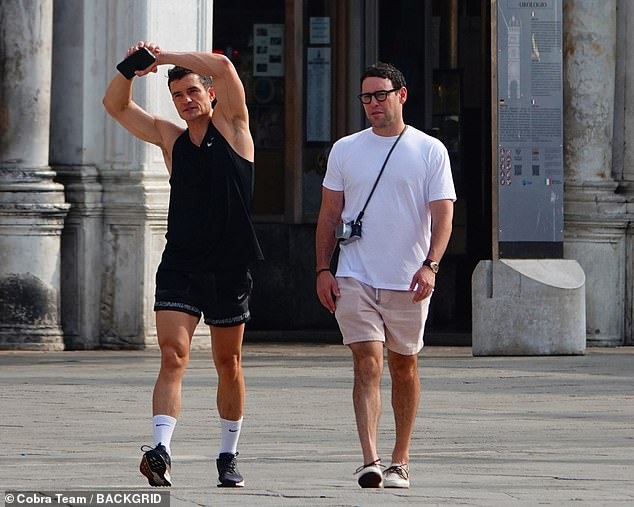 The actor was also seen enjoying a chat with music manager Scooter Braun - who used to manage Katy