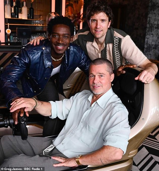 The A-lister, 61, was joined in the capital by co-star of his new F1 movie Damson Idris (left) and radio host Greg James to take on a series of challenges at F1 Arcade - but came dead last