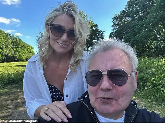 Throughout everything, new girlfriend Katie Alexander, 22 years his junior, has kept a smile on Holmes's face